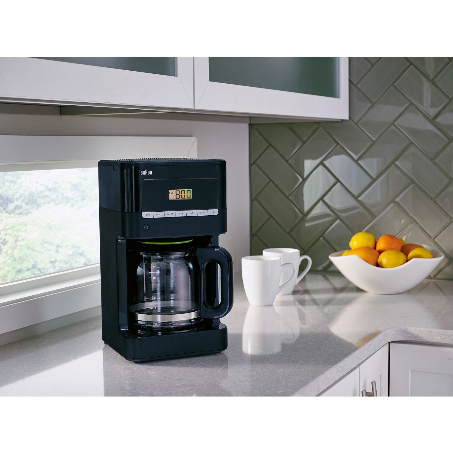 Black Braun 12-cup drip coffee maker with digital screen and glass carafe