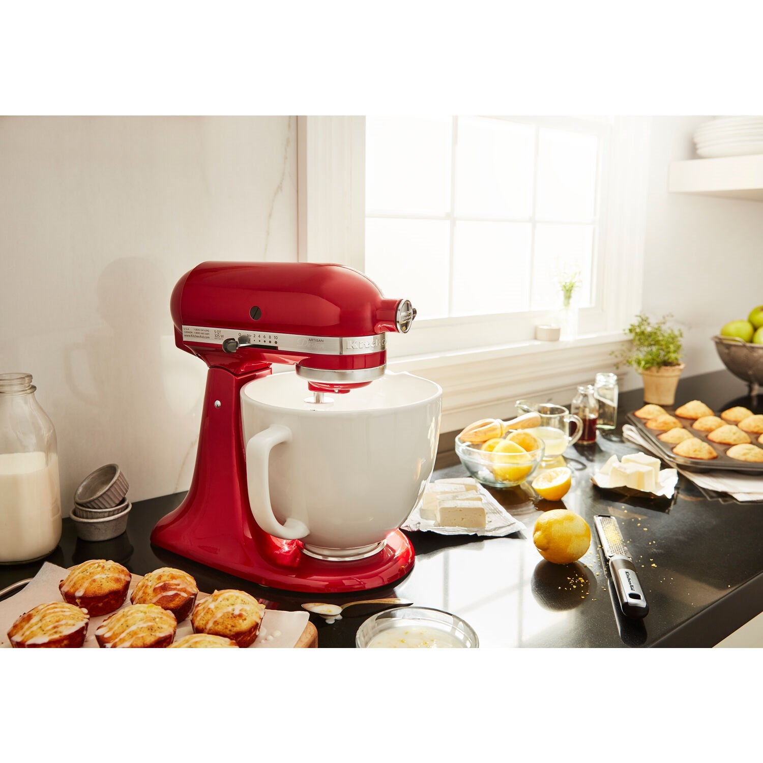 KitchenAid 5-quart ceramic mixing bowl with white finish, on red stand mixer