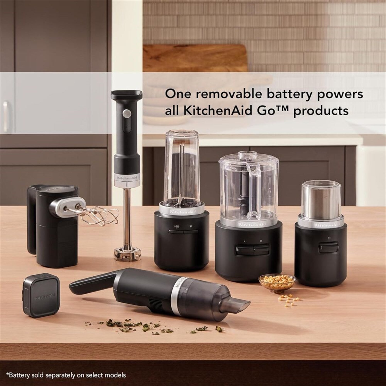 KitchenAid cordless hand mixer set in black matte with removable battery base