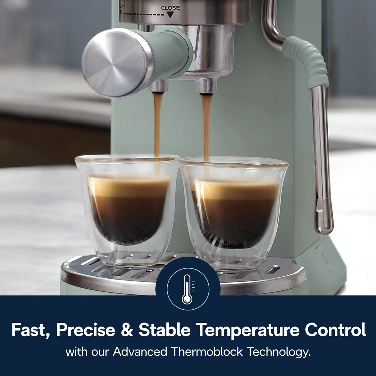 De'Longhi Dedica Duo espresso machine with dual spouts, mint green, pouring into two cups