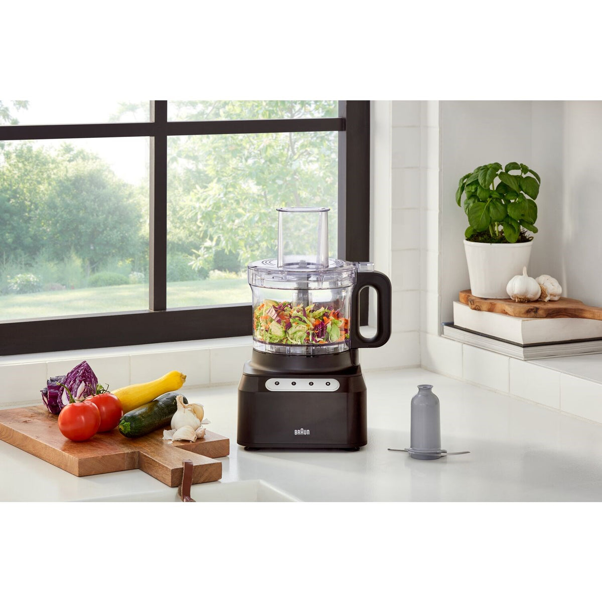 Braun Easy Prep 8-cup food processor with clear bowl and black base on kitchen counter