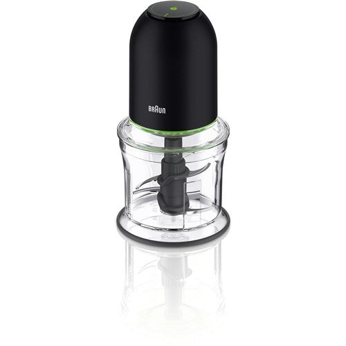 Black mini food chopper with clear bowl and central blade, front view on base