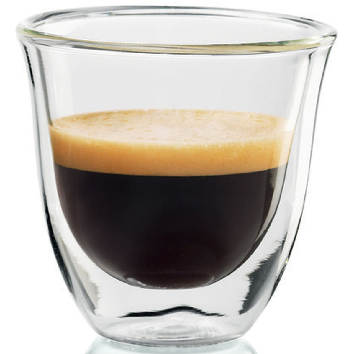 Clear espresso glass with dark coffee and light crema layer