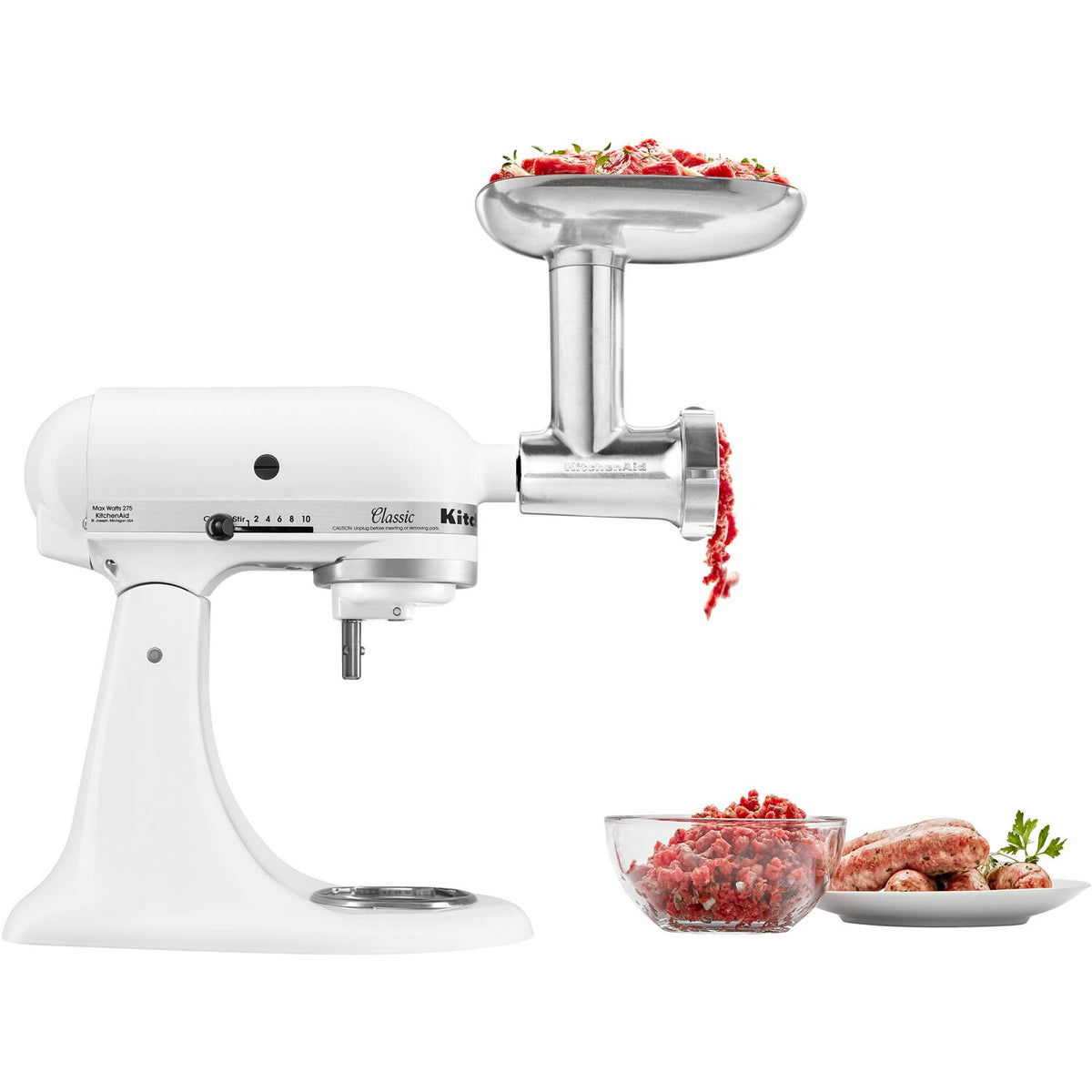 White KitchenAid stand mixer with metal meat grinder attachment and hopper