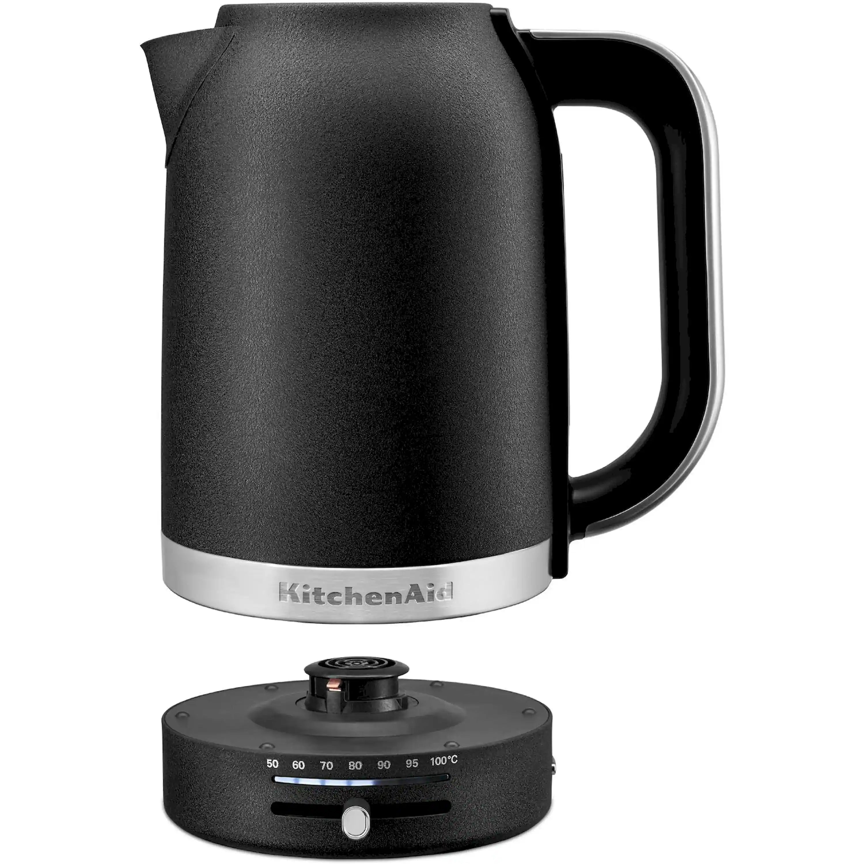 Black electric water kettle on heating base, side view with handle.