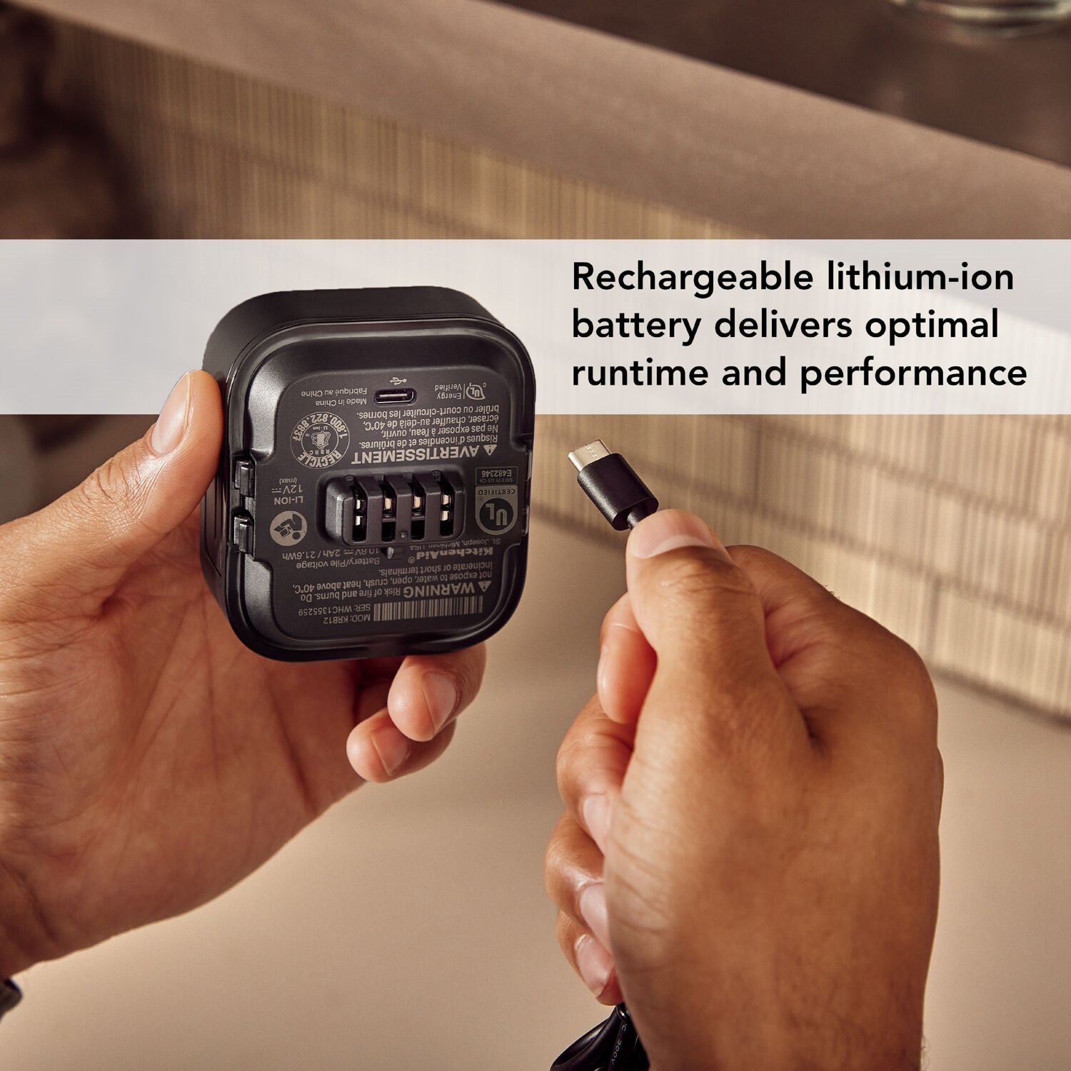 Black KitchenAid 12V cordless battery pack with multi-port connector