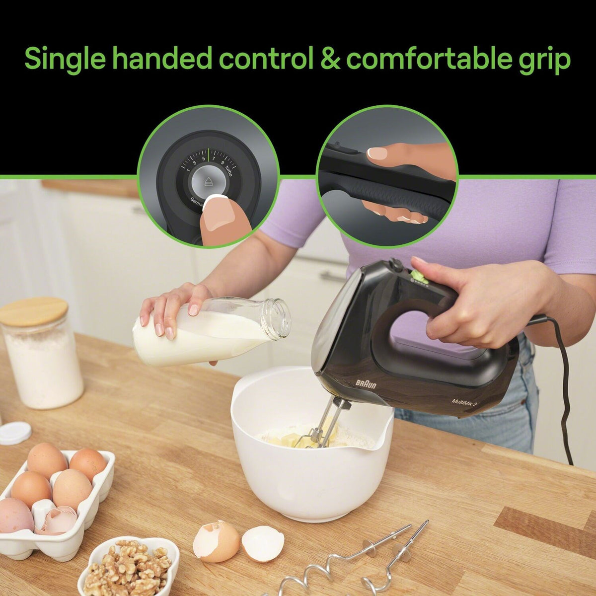 Black Braun hand mixer with beaters and dough hooks, shown with accessory bag