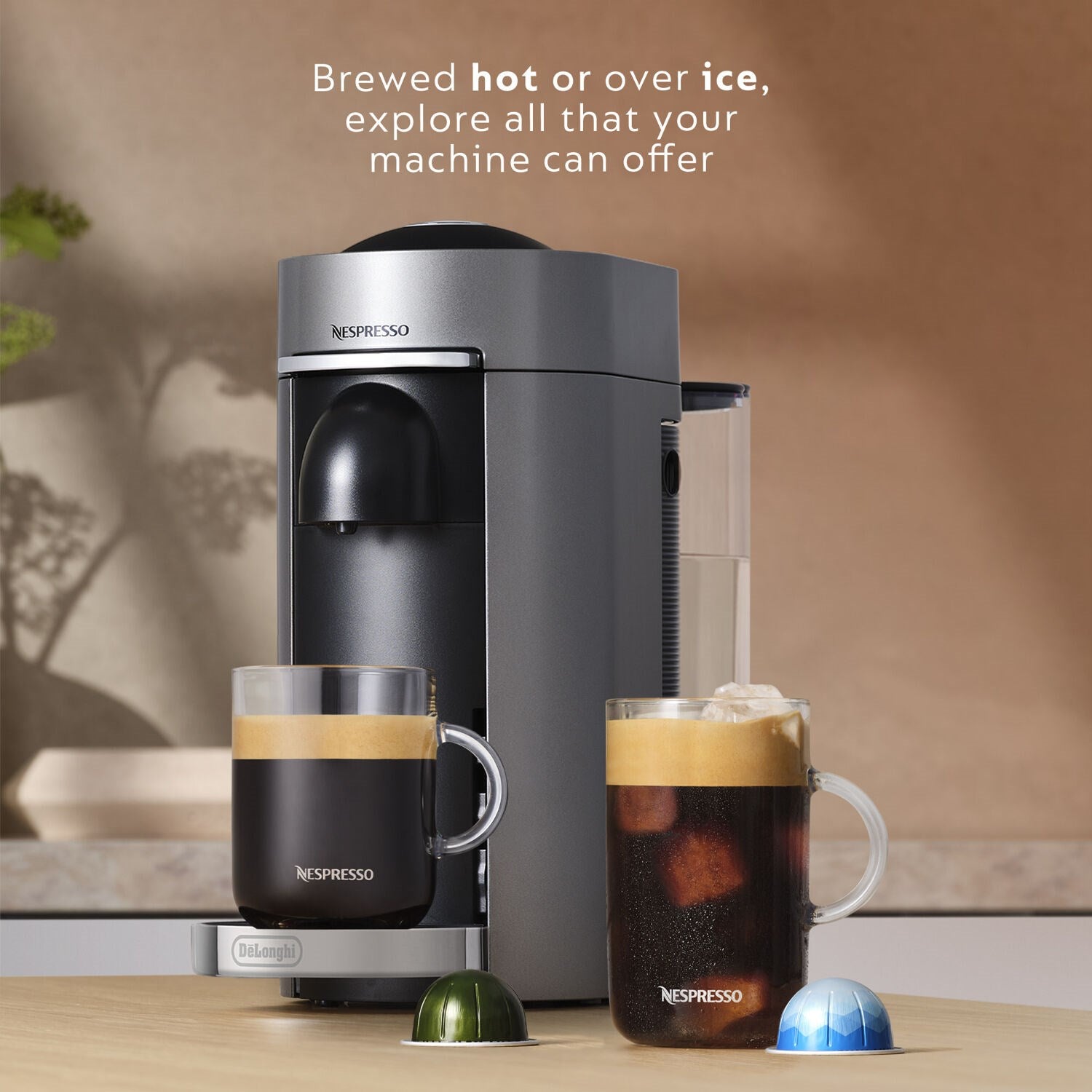 Single-serve coffee and espresso machine with two brewed cups and capsule pods