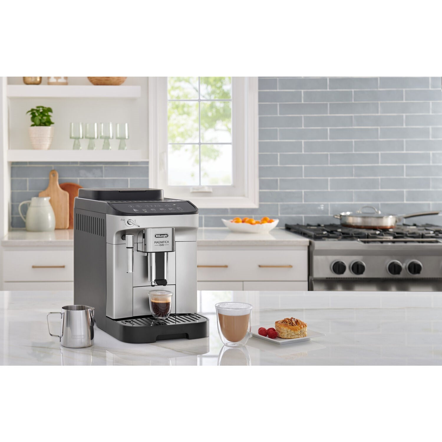 De'Longhi Magnifica Evo coffee machine with cups on the drip tray