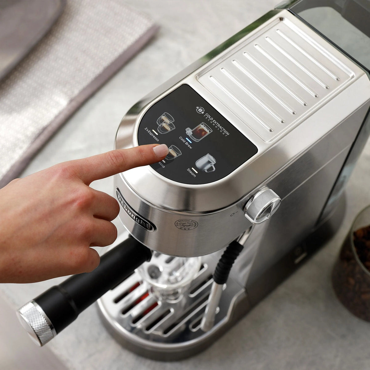 Stainless espresso machine with control panel and an indicator dial