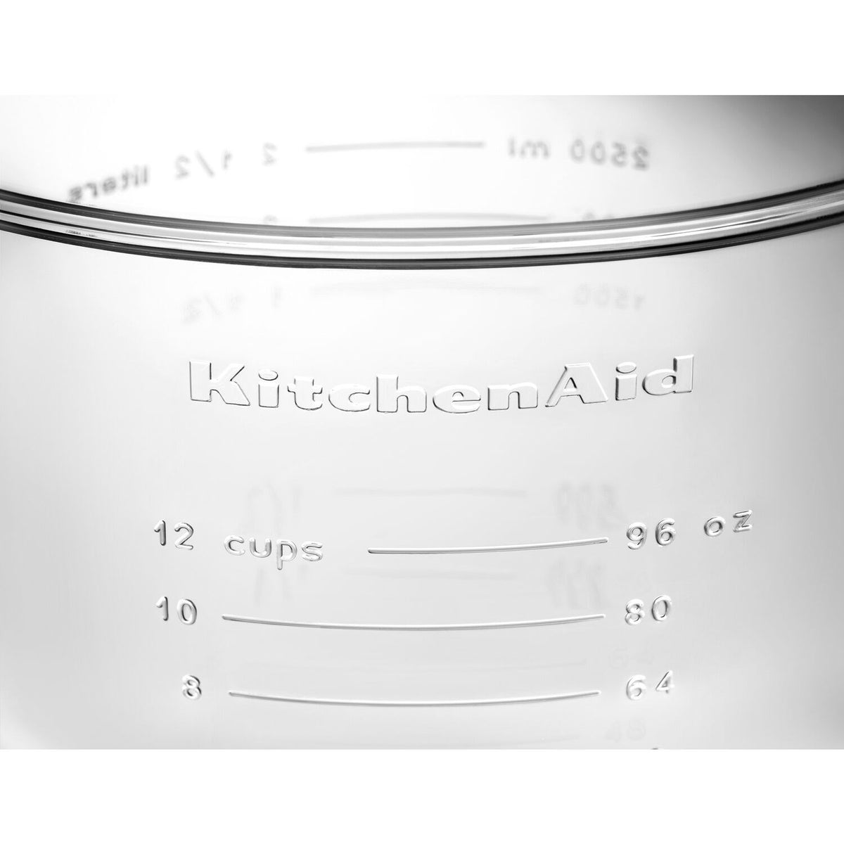 KitchenAid glass mixing bowl lid side with cup and ounce measurement markings