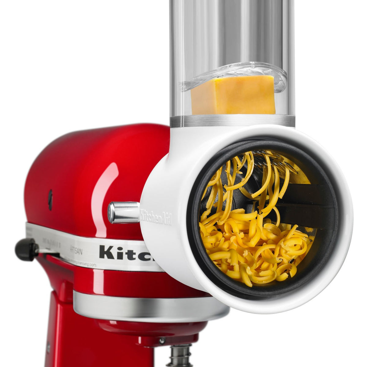 KitchenAid Fresh Prep slicer/shredder attachment with yellow shredded food in chute