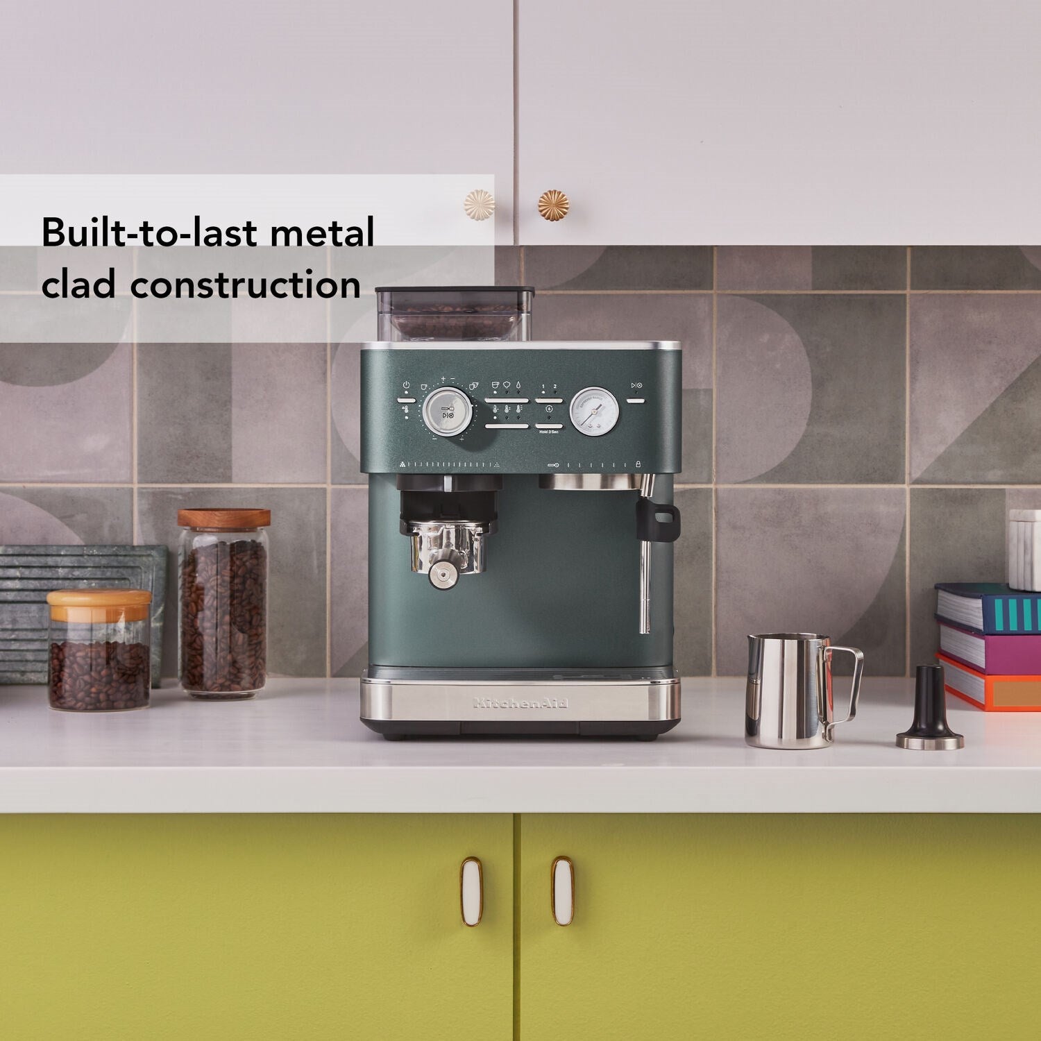 Juniper green espresso machine on kitchen counter with steam wand and drip tray