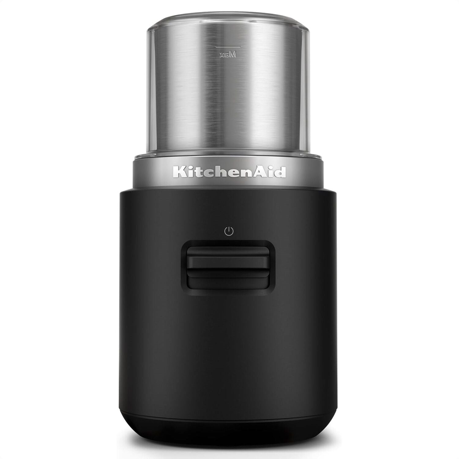 Black cordless coffee grinder with stainless top and front on/off control button