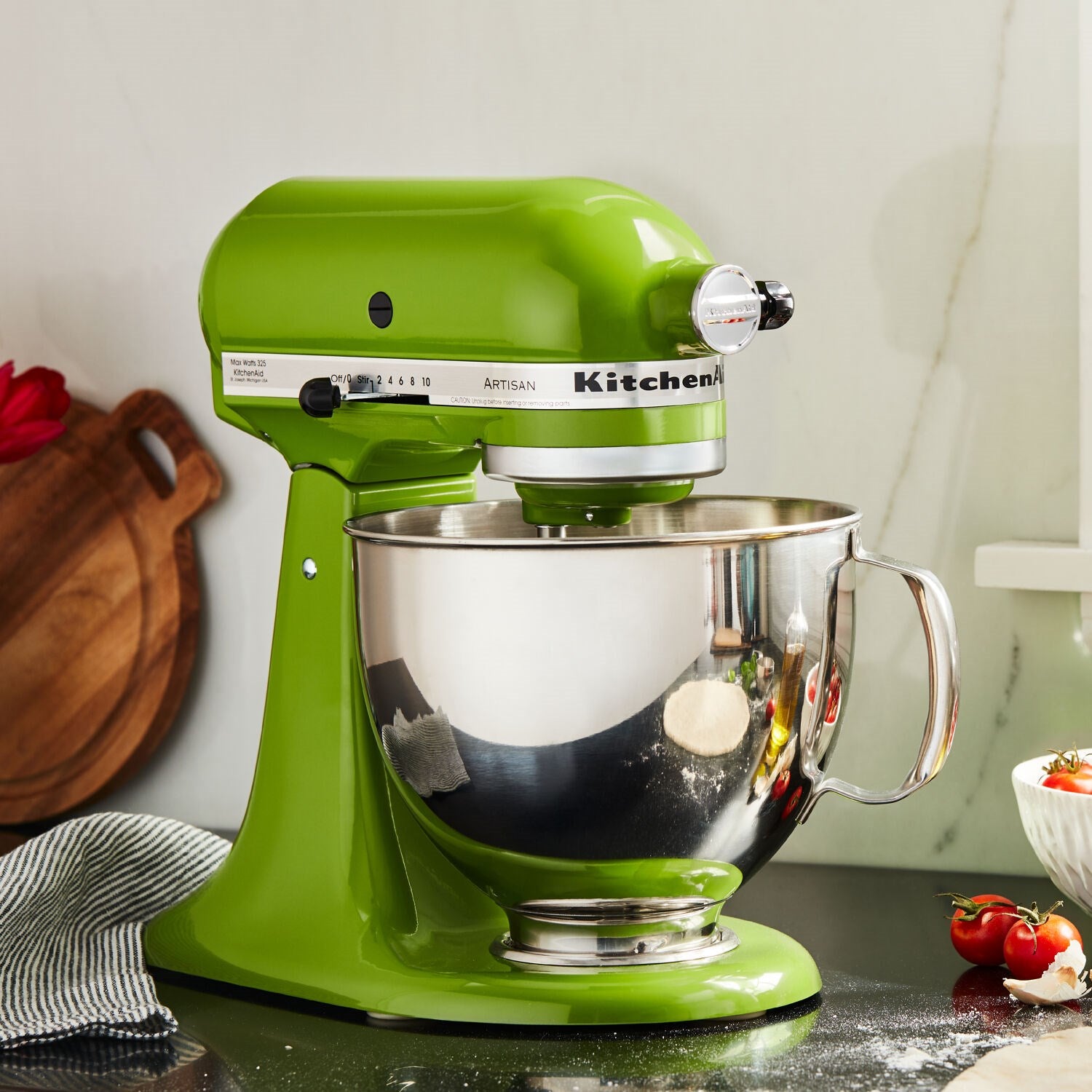 Matcha green tilt-head stand mixer with stainless bowl and mixing paddle