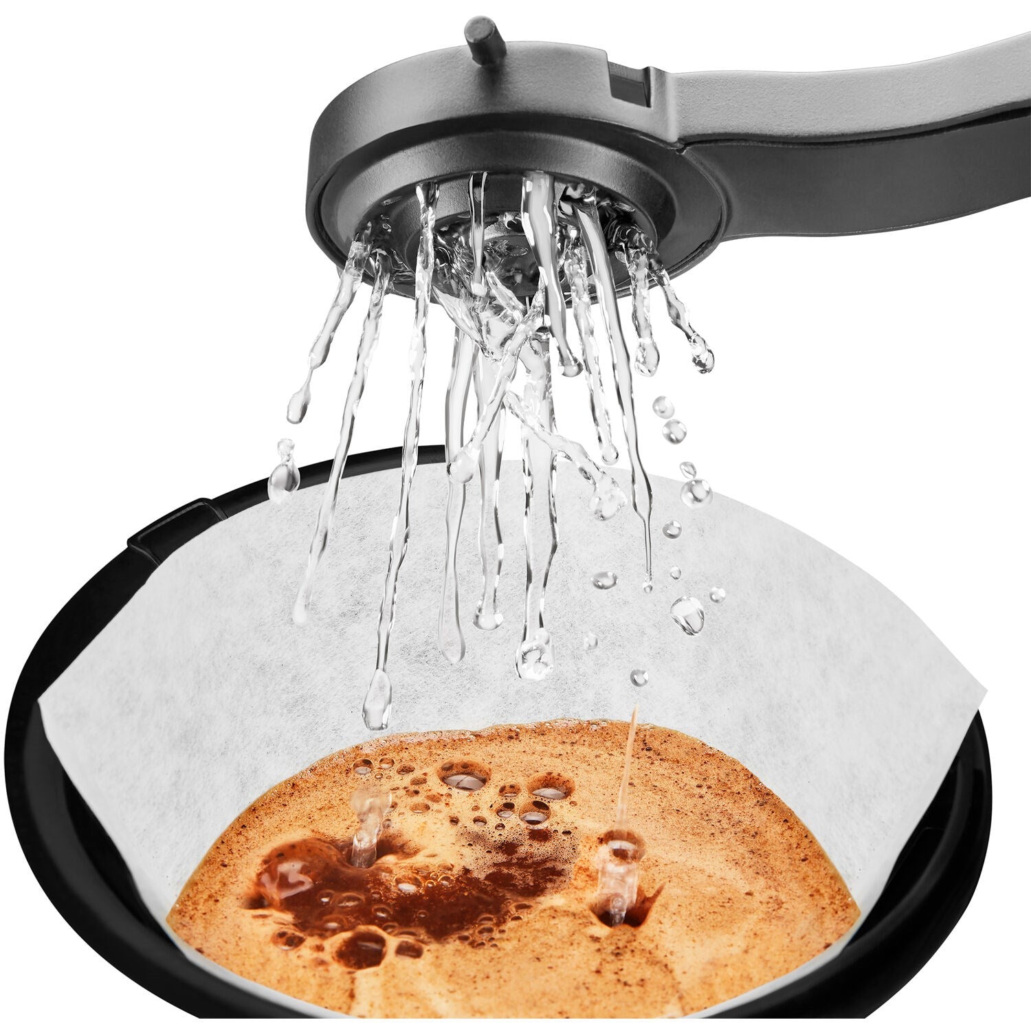 Water pouring from showerhead onto coffee bed in KitchenAid drip brewer