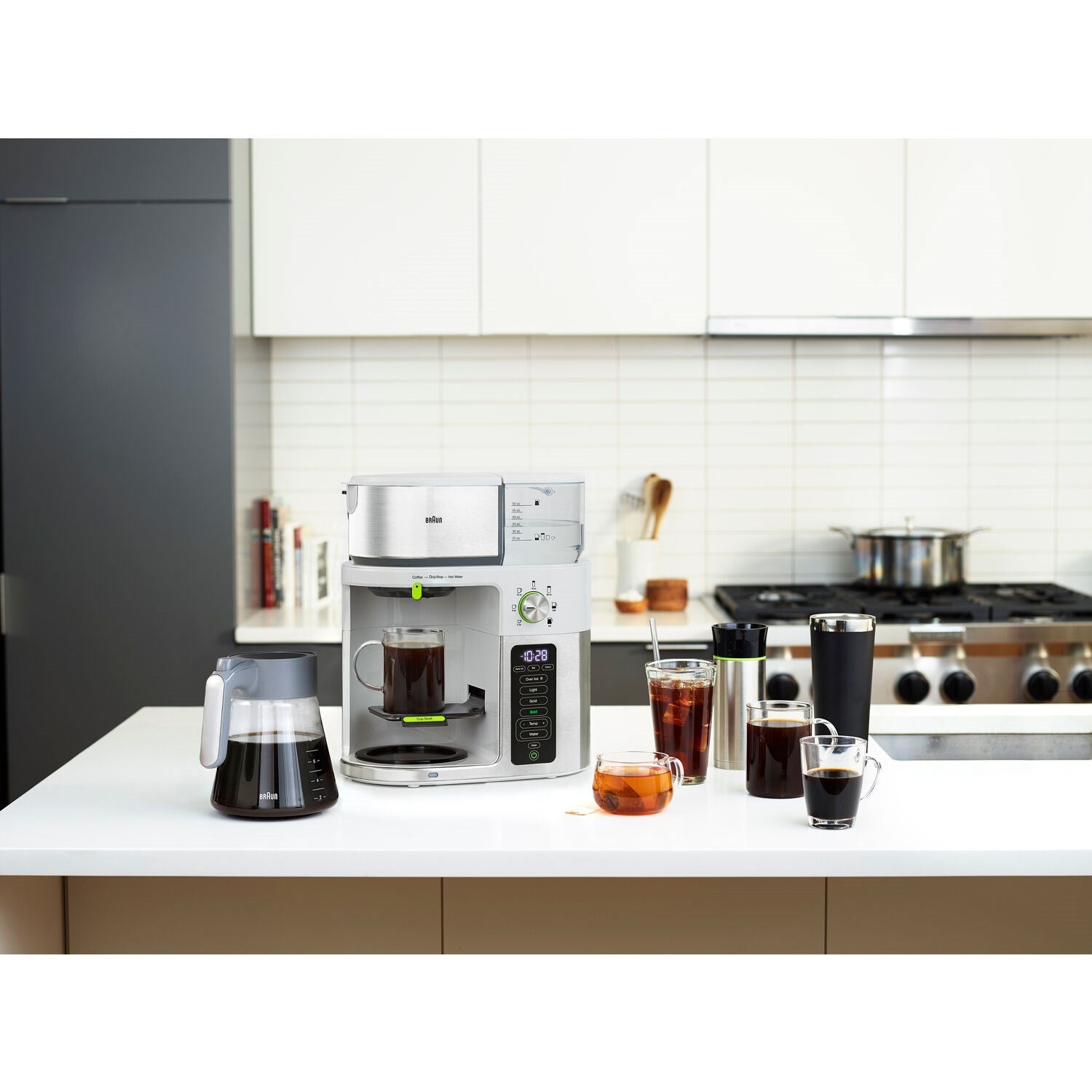 Stainless steel and white coffee maker with glass carafe and built-in control panel