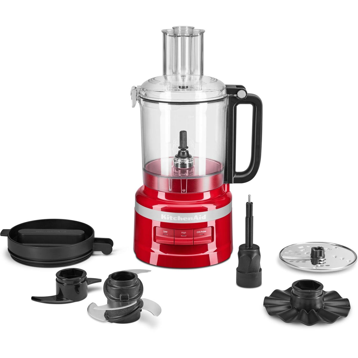 KitchenAid food processor in red with clear lid and included blade attachments