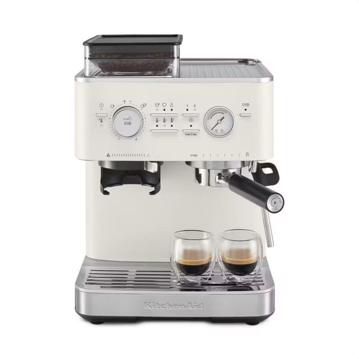 Porcelain white espresso machine with twin cups on drip tray and steam wand