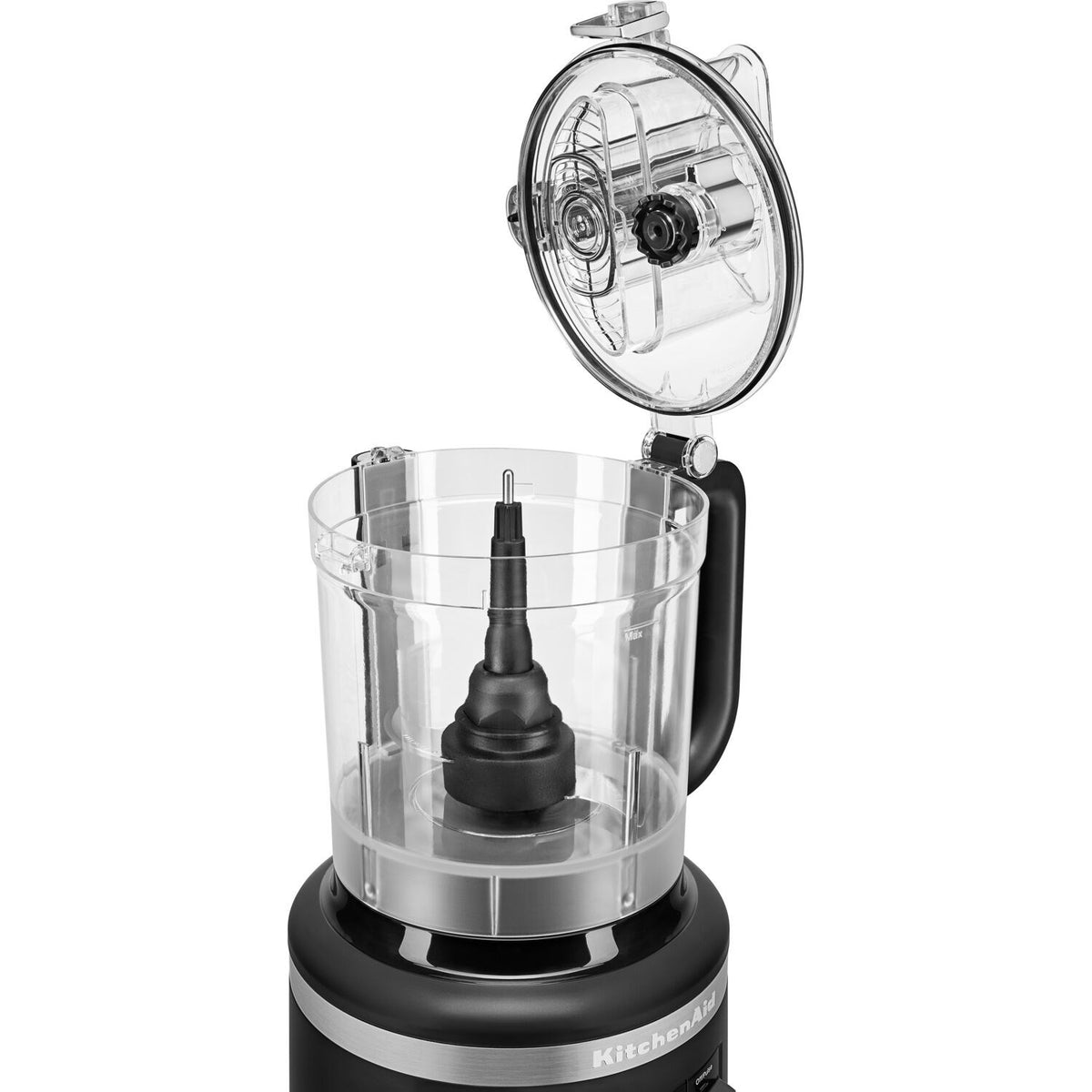 Food processor with open lid, clear bowl, and central blade assembly