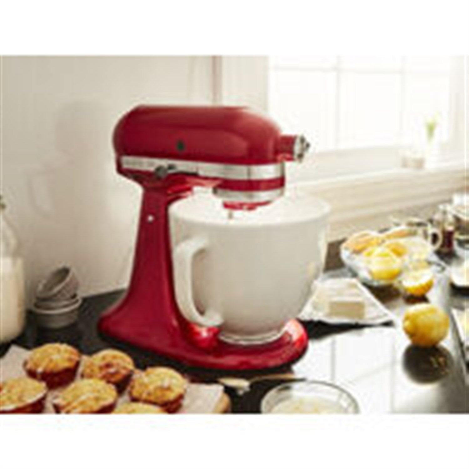 KitchenAid 5-quart ceramic mixing bowl with white chocolate finish, shown on mixer