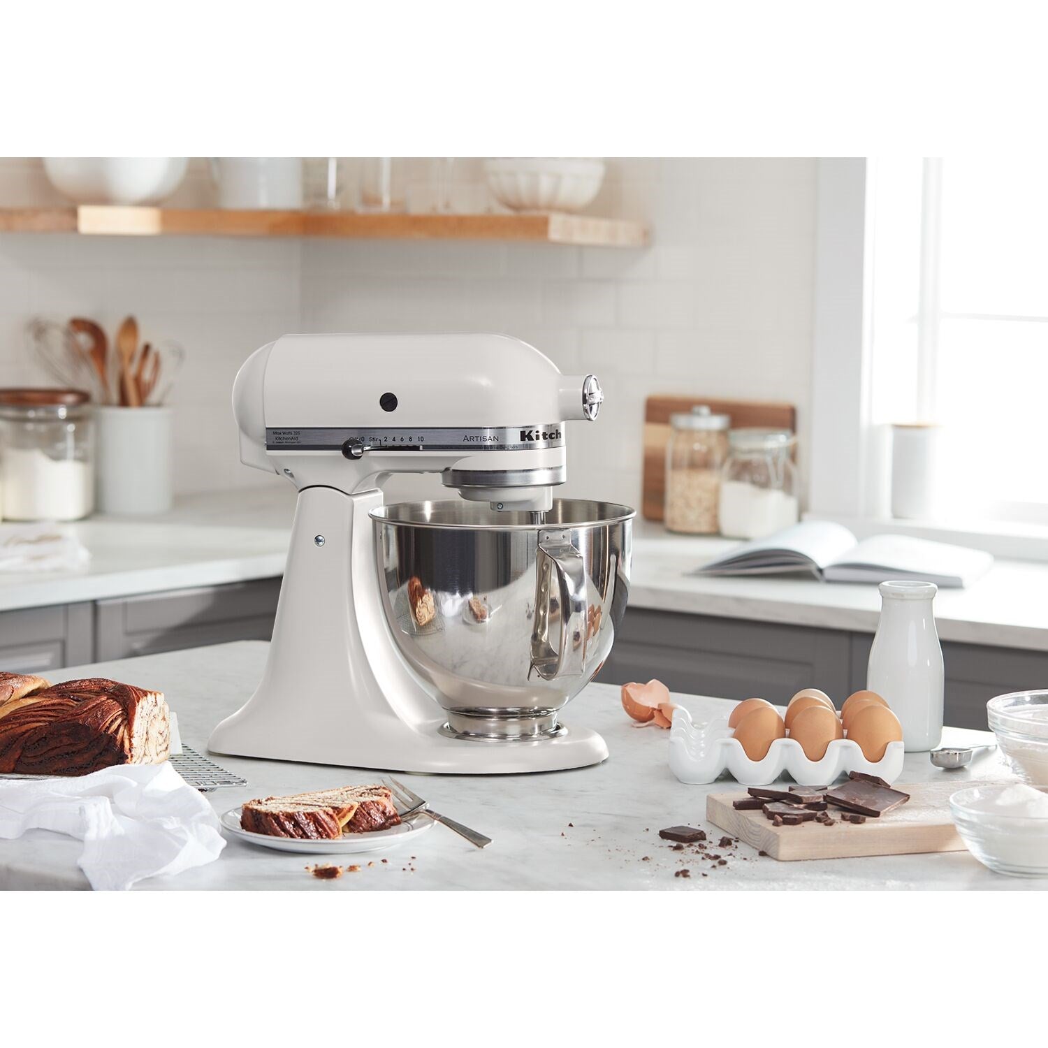 Milkshake tilt-head stand mixer with stainless steel bowl, beater, and accessory beakers