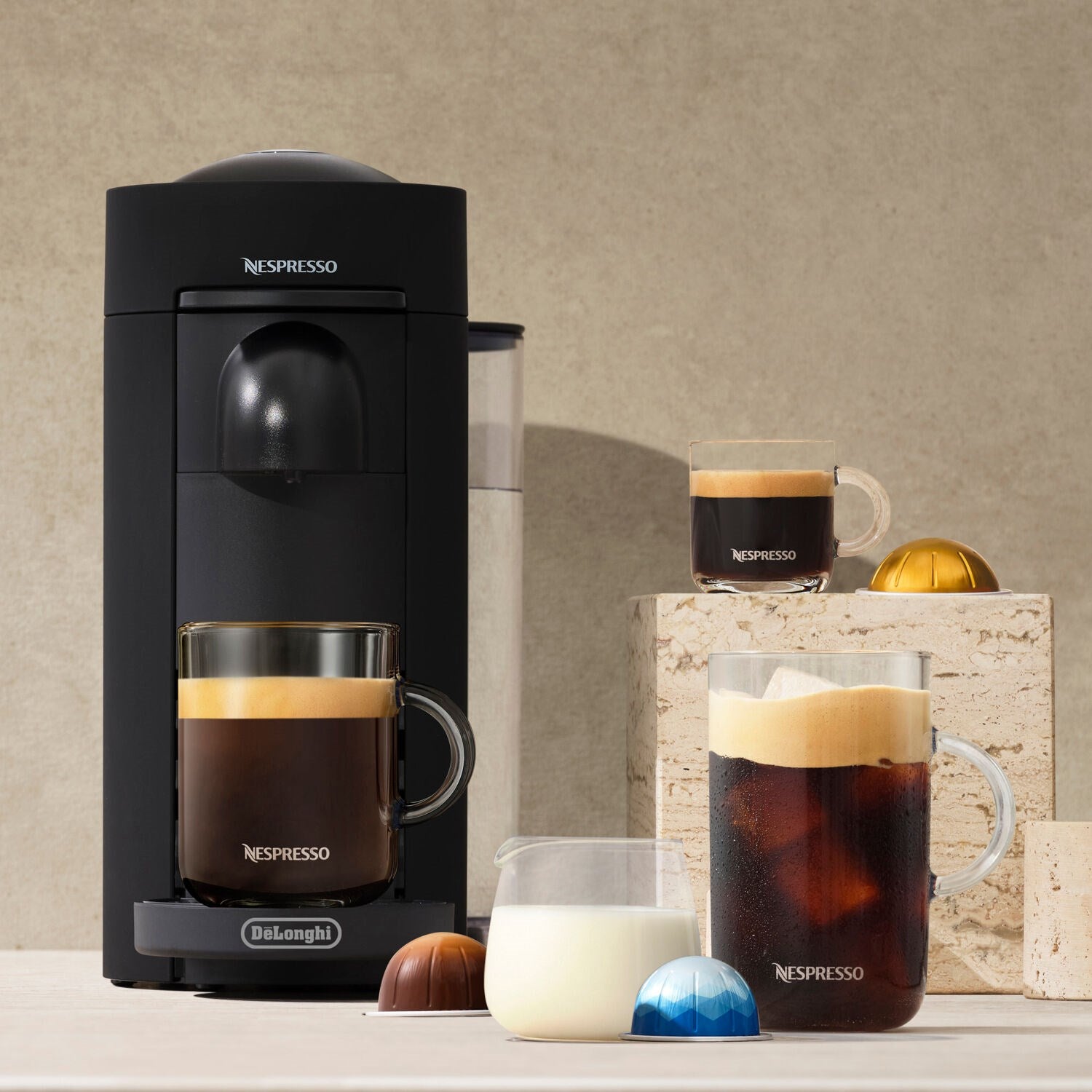 Black De'Longhi Nespresso Vertuo Plus single-serve coffee and espresso machine