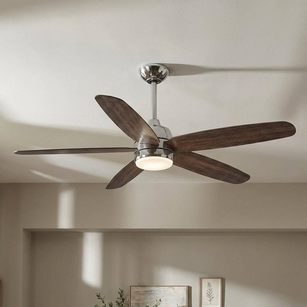 Chrome-mounted ceiling fan with five dark wood blades and glowing round light
