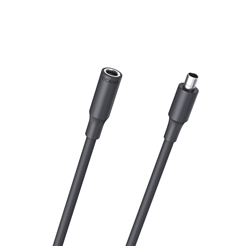 Black DC extension cable with two cylindrical plug ends, matte connector housings