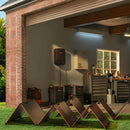 Jackery portable power station mounted for outdoor backup, with connected cables and wall unit