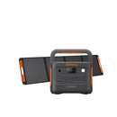 Portable power station with foldable solar panel (black) and orange side accents
