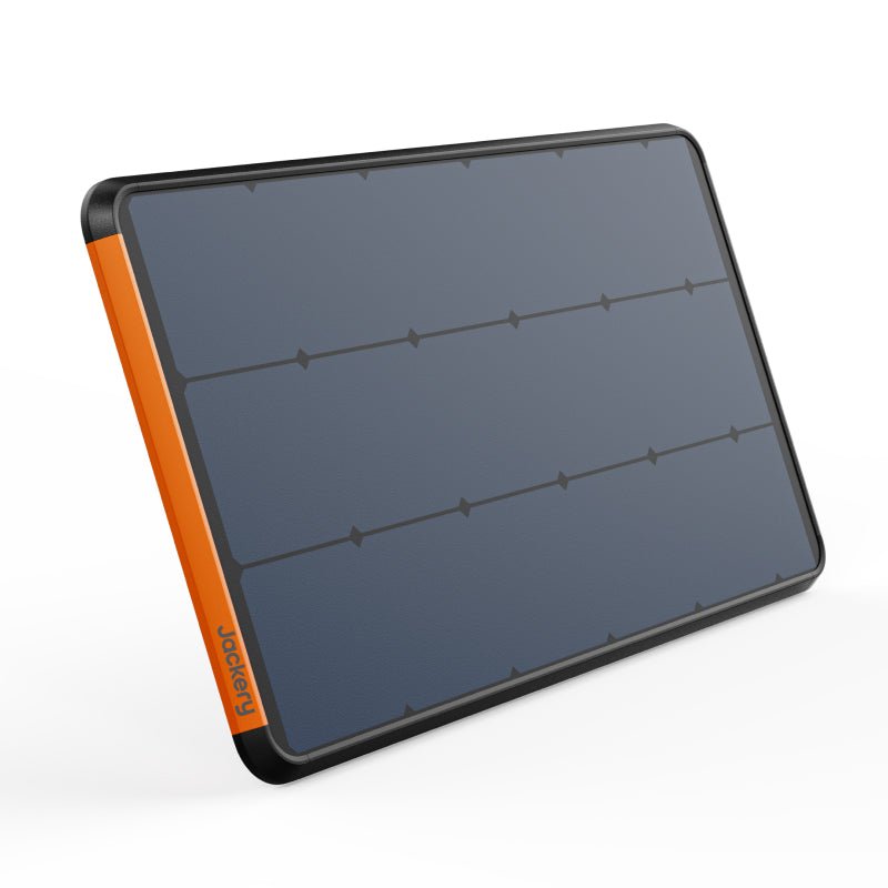 Jackery dark solar panel with orange side frame, rectangular glass surface