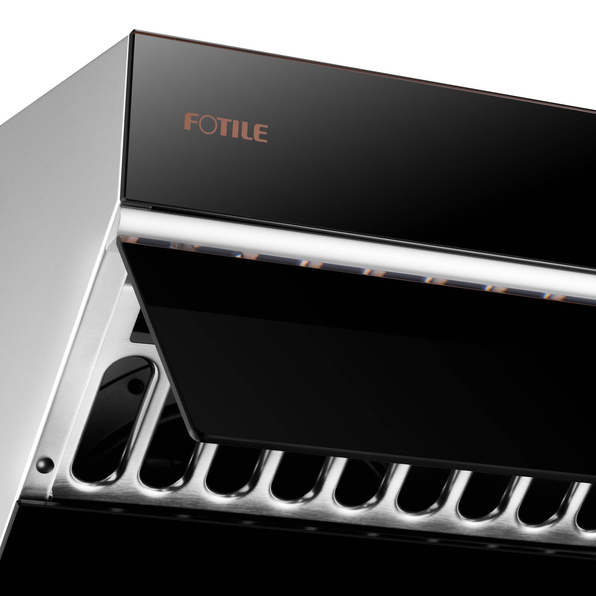 Range hood vent grille beneath black canopy with stainless fan housing