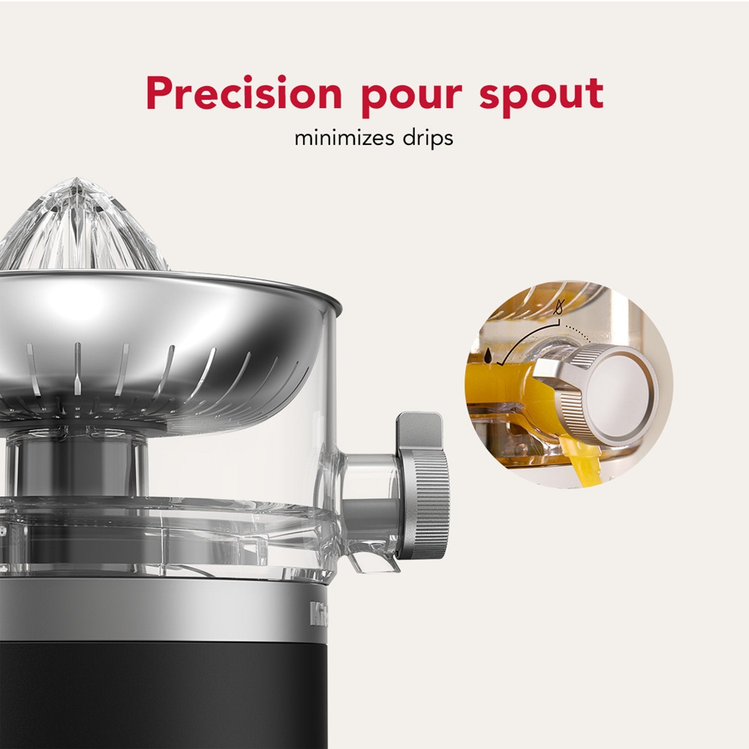 Precision pour spout on black matte cordless citrus juicer with reamer over clear chamber