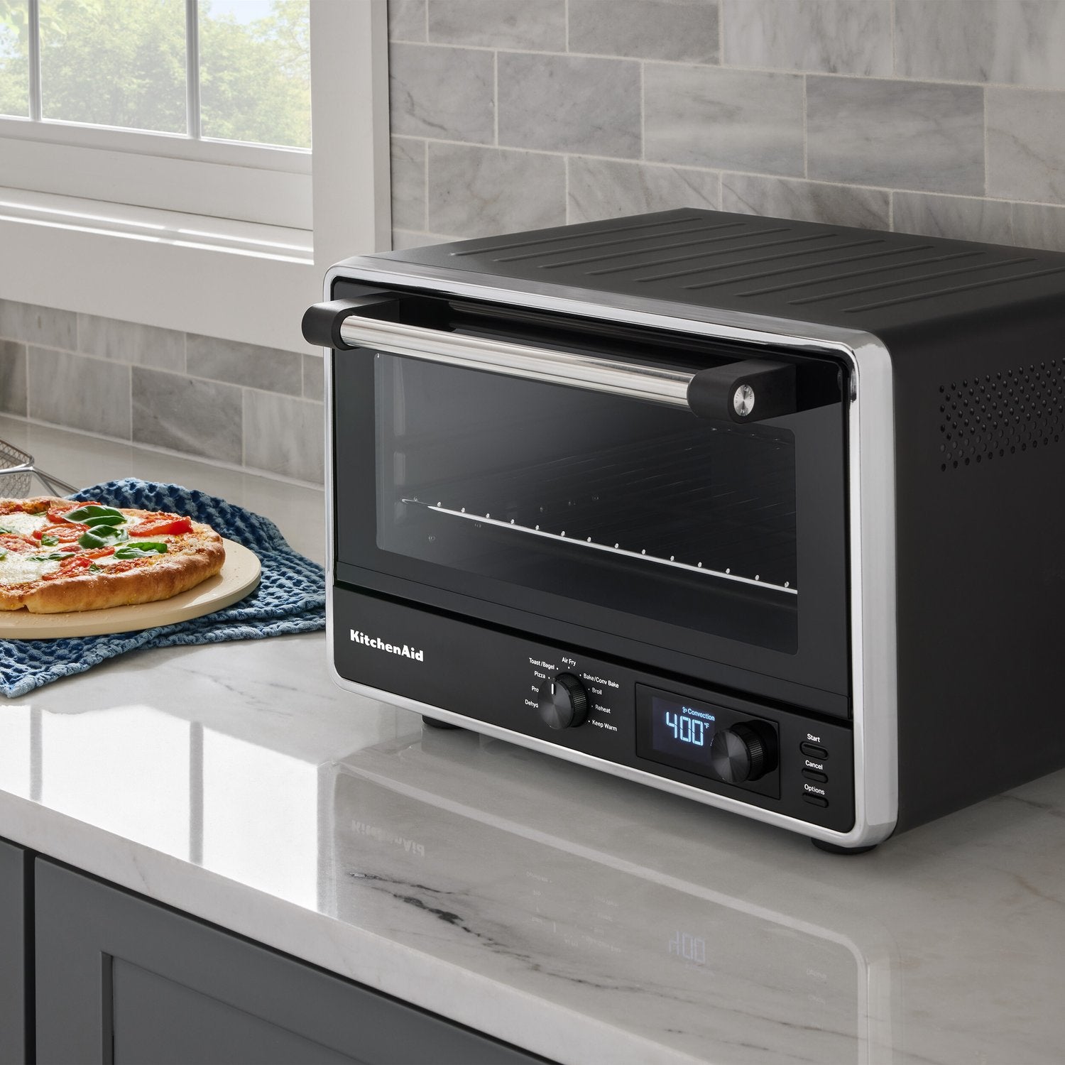 Black matte countertop air-fry oven with digital display and front glass door
