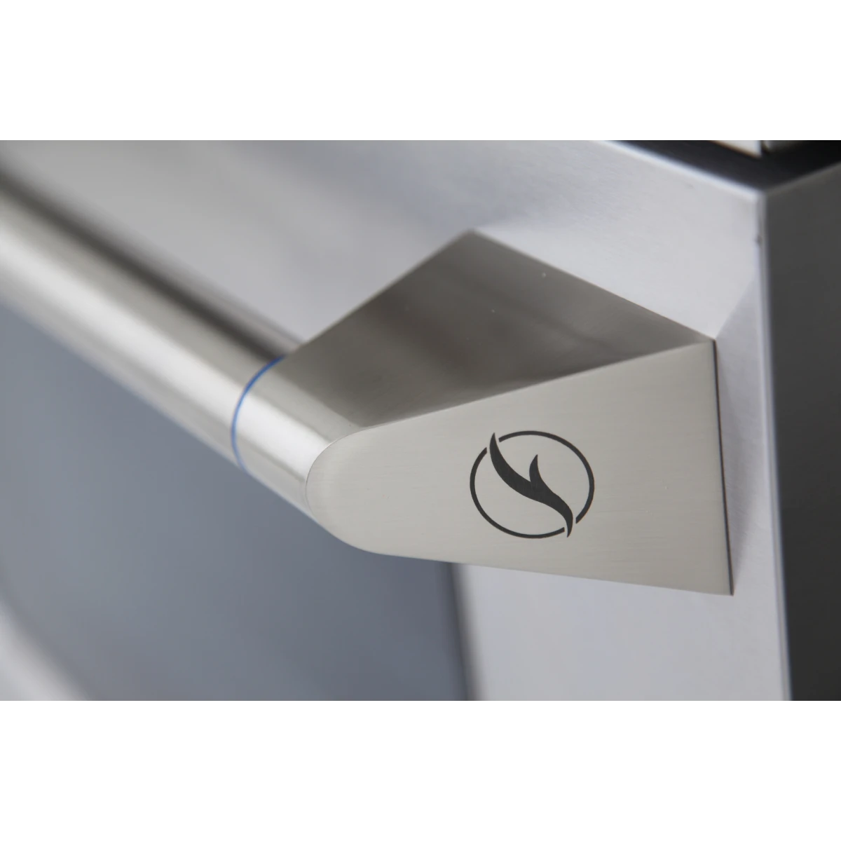 Stainless control knob with flame icon on dual fuel range