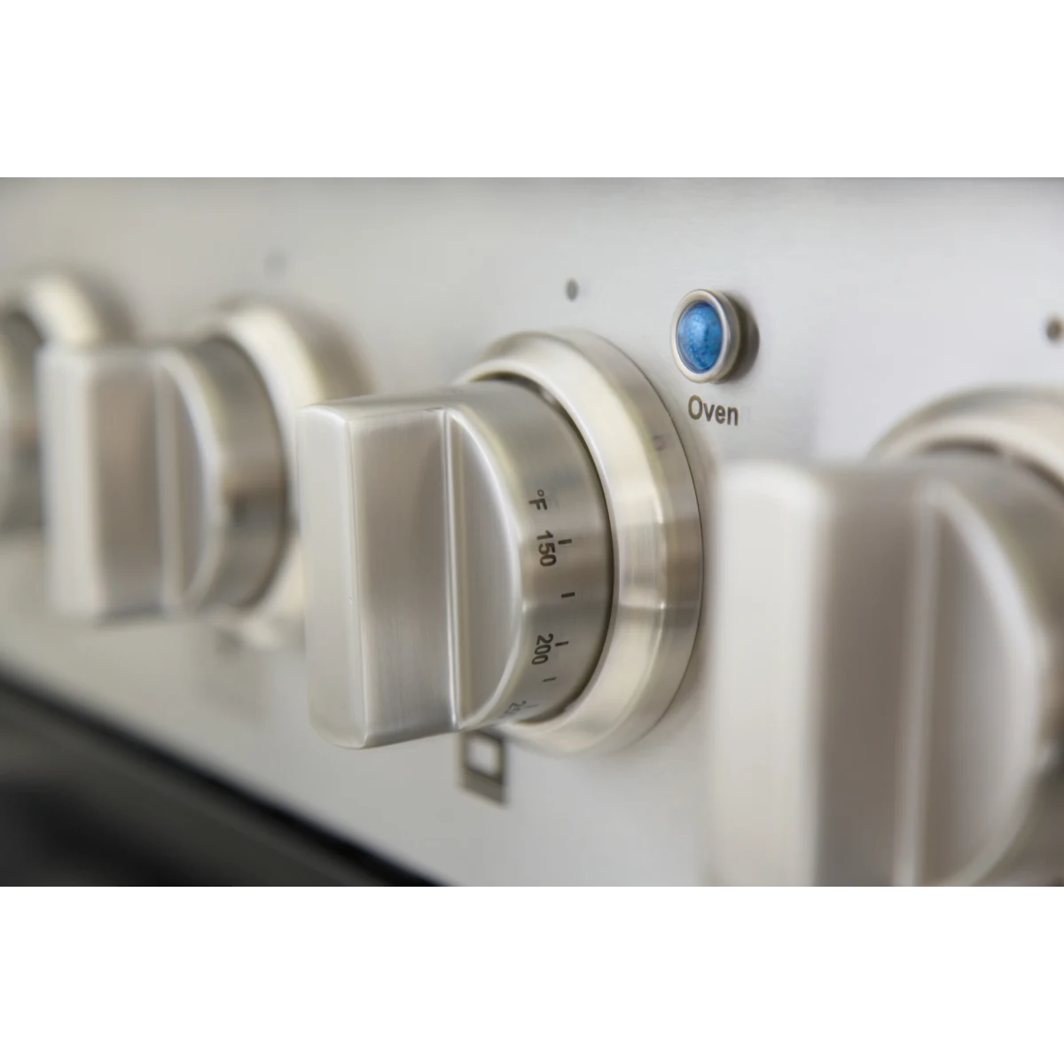 Oven temperature knob with blue indicator and temperature markings