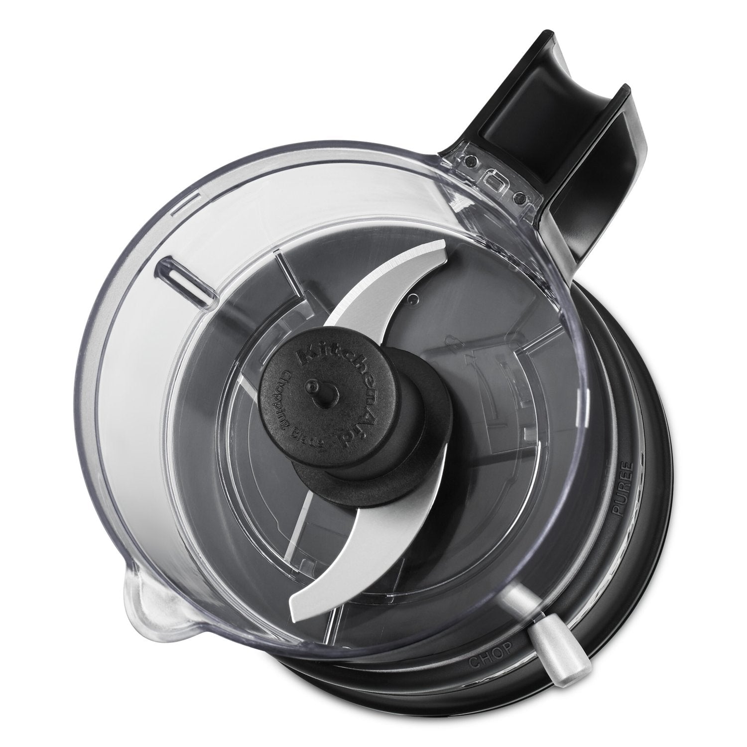Food chopper blade assembly inside clear bowl with black blade hub