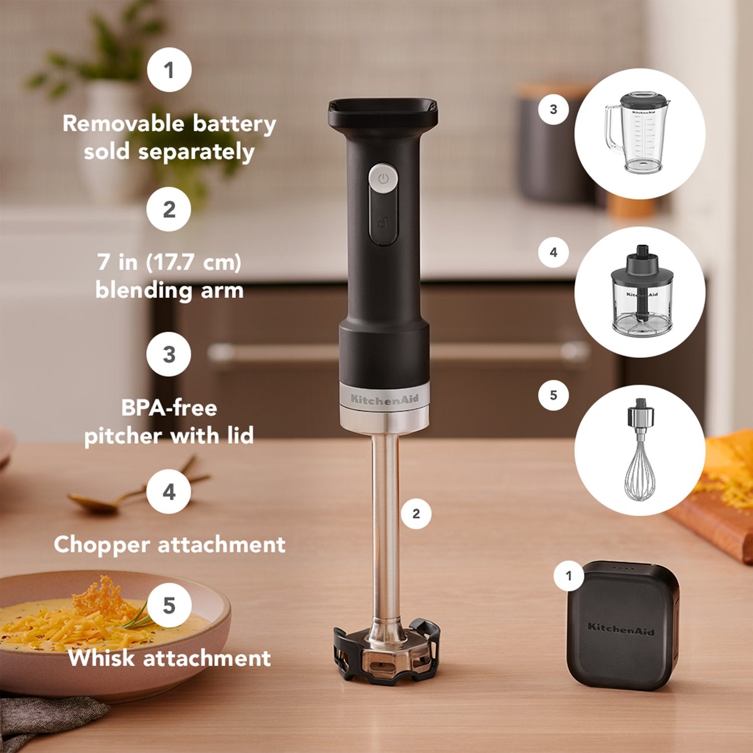 Black matte cordless hand blender with 7 in blending arm and battery pack.
