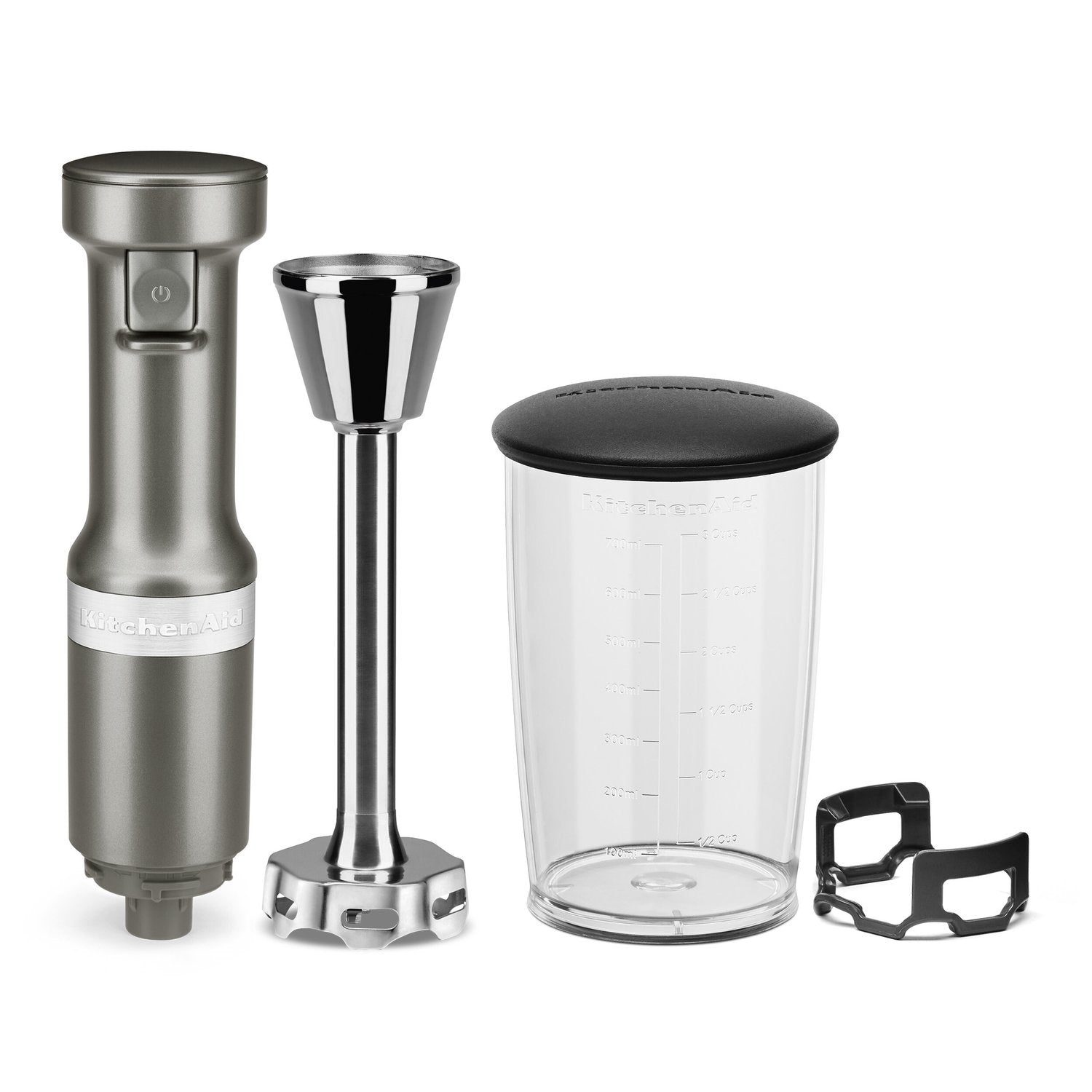 Silver immersion blender kit with blending cup, clear jar and lid, and blade base
