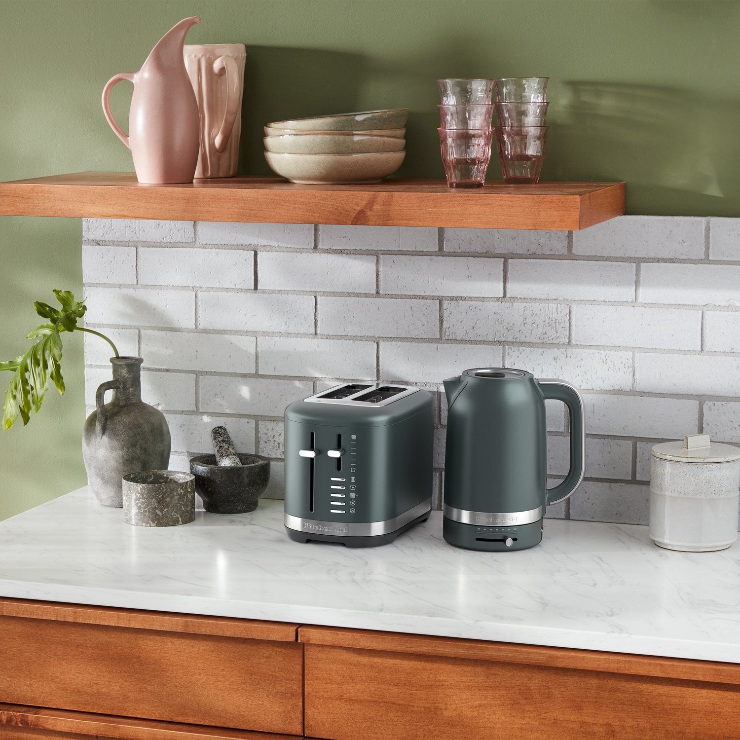 KitchenAid 2-slice toaster in juniper, compact design with slots and front lever