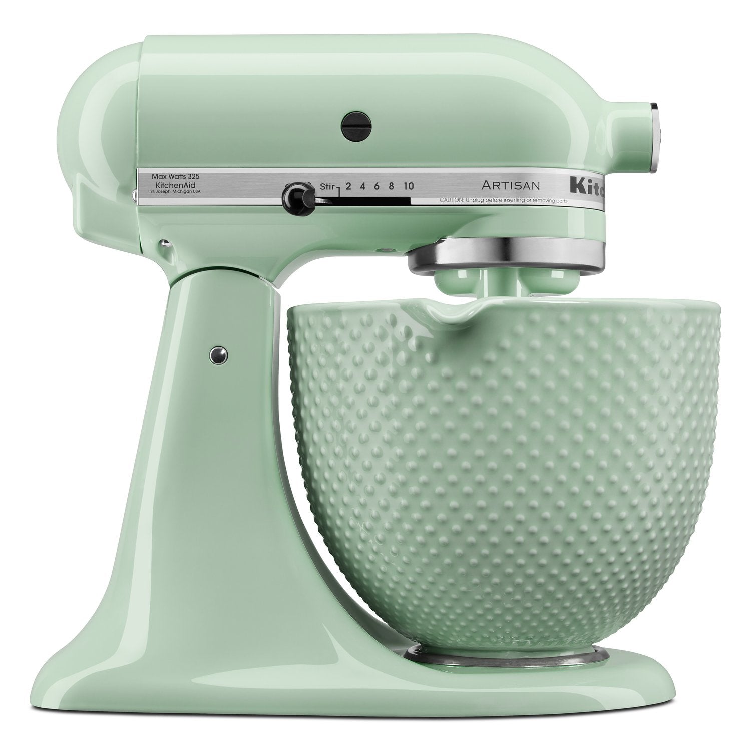 Mint green ceramic mixing bowl with textured finish, attached to a stand mixer