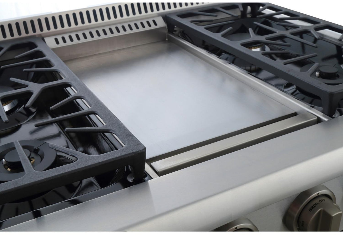 Stainless steel gas cooktop with burner grates and center burner area