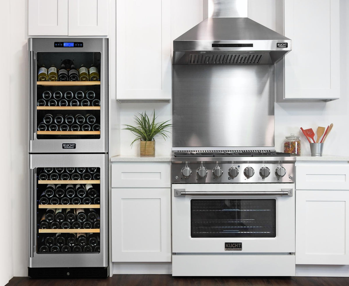 White propane gas range with stainless hood, front burners, and oven door window.