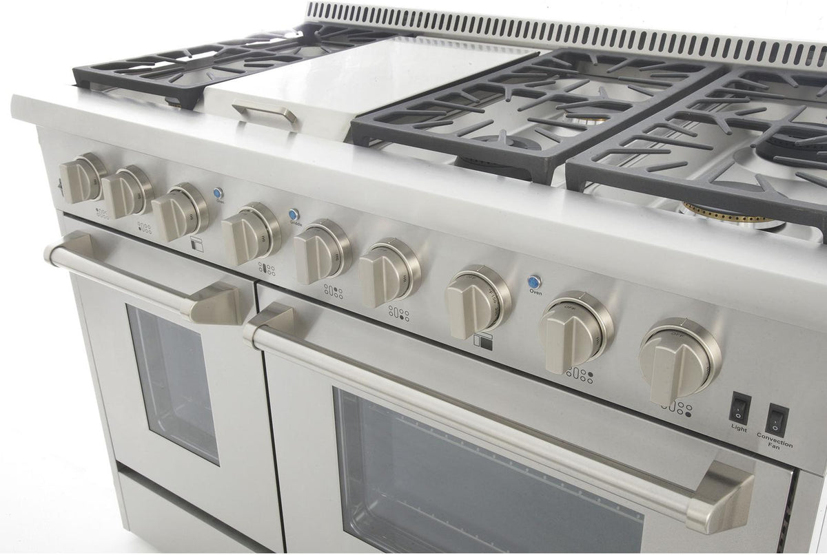 Stainless propane gas range angled view showing burner knobs and oven windows