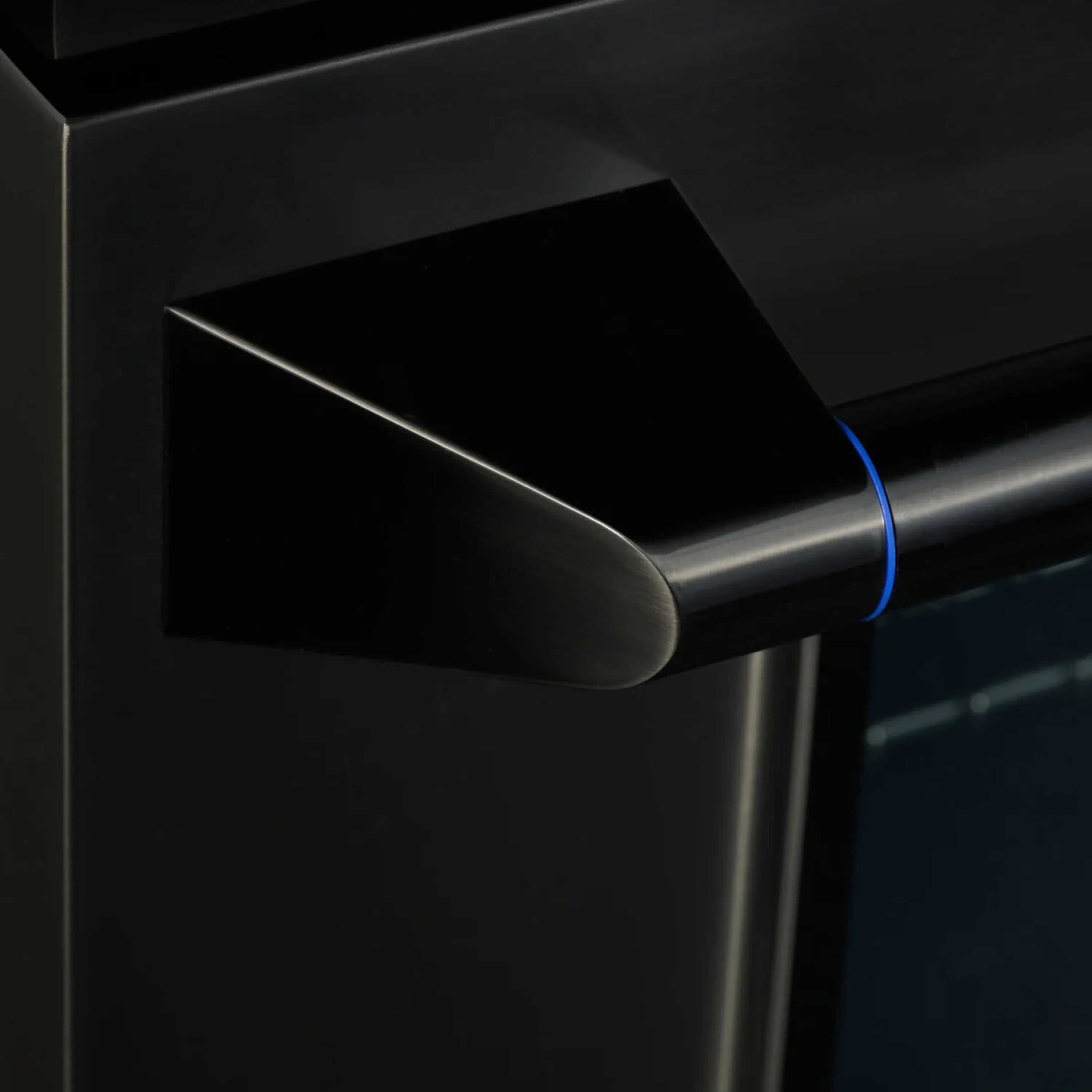 Gas dual-fuel range oven handle with brushed finish and blue accent line