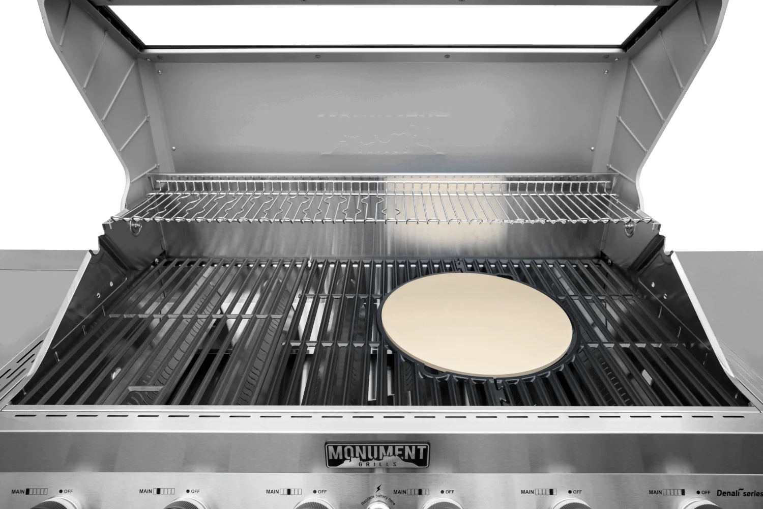 Round cordierite pizza stone on grill racks, pale tan round disc