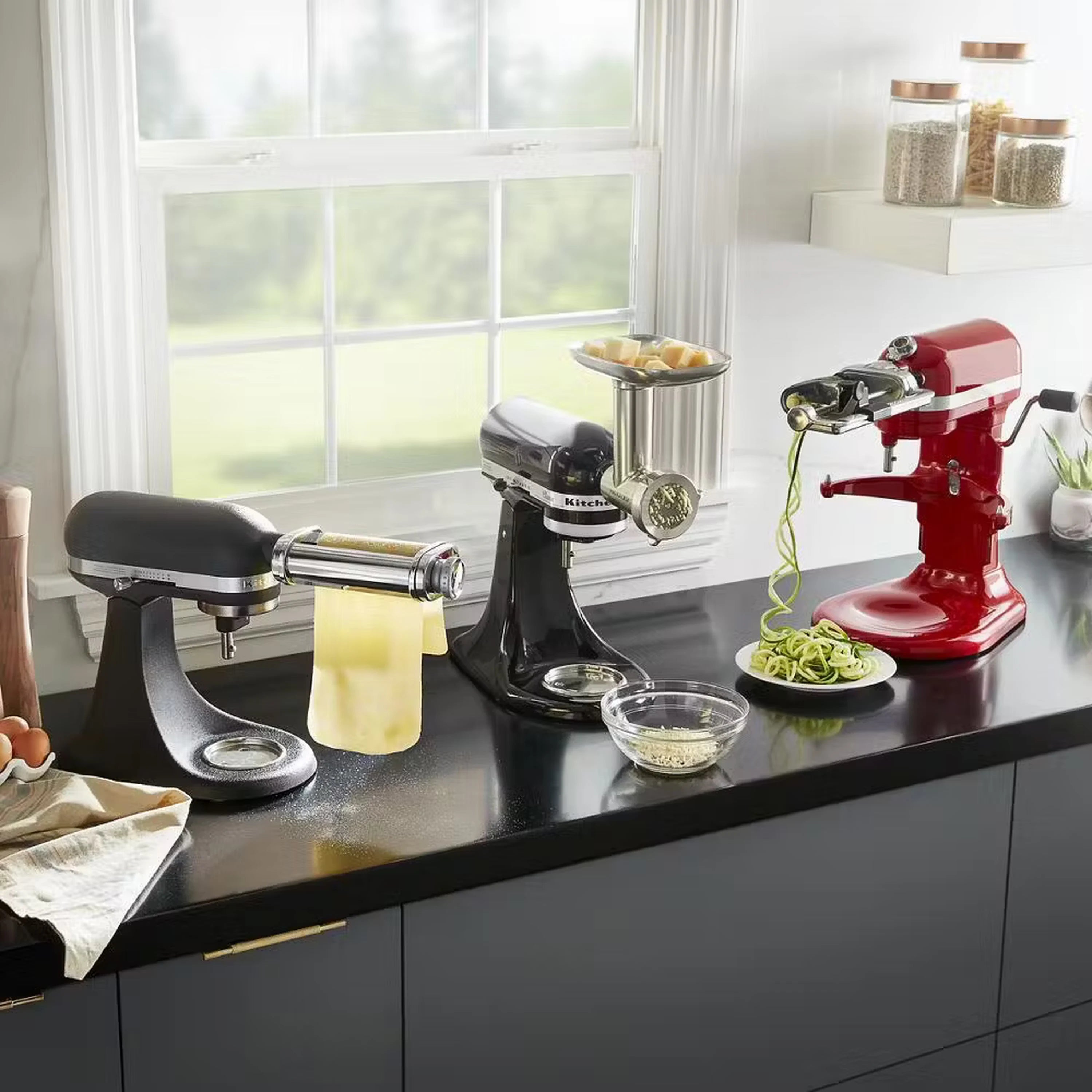Onyx black stand mixer with stainless bowl and dough hook attachment