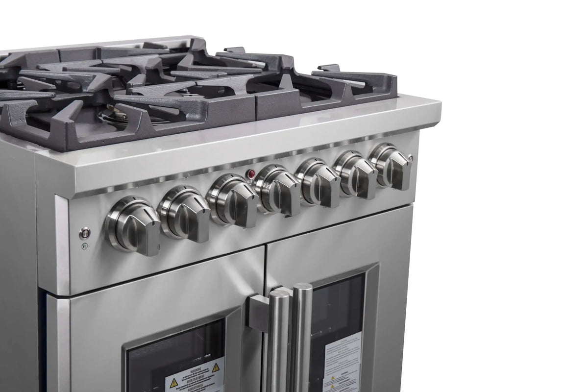 Stainless steel range front with burner grates and row of control knobs