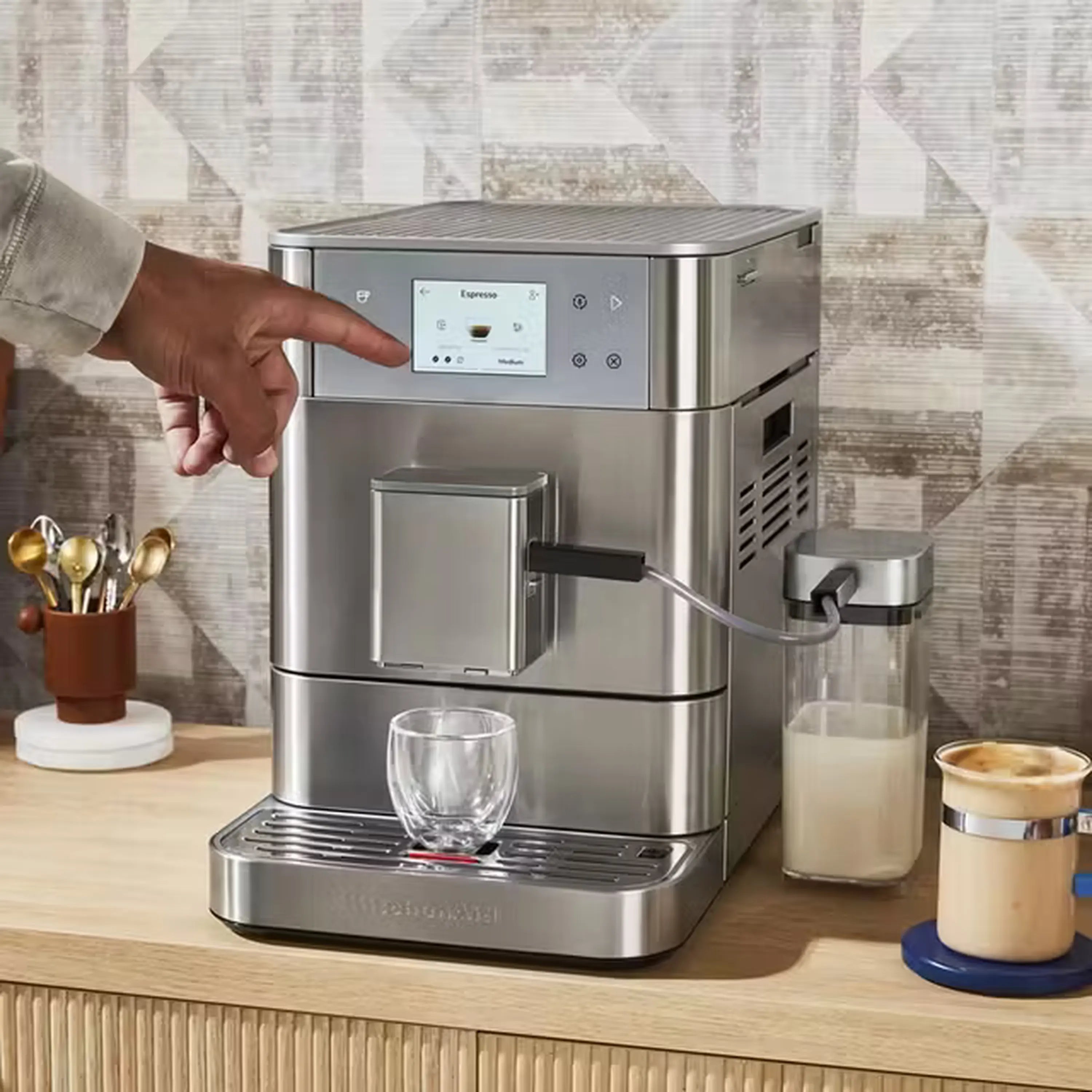Stainless steel fully automatic espresso machine with milk container and cup tray